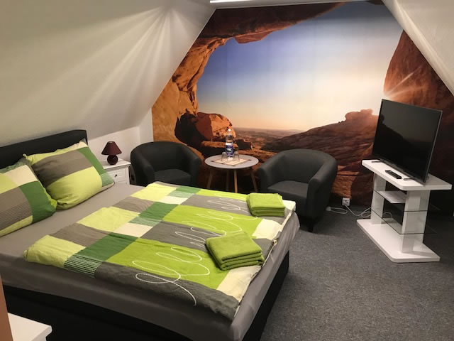 Ferienwohnung Zieschang Schlafzimmer Doppelbett